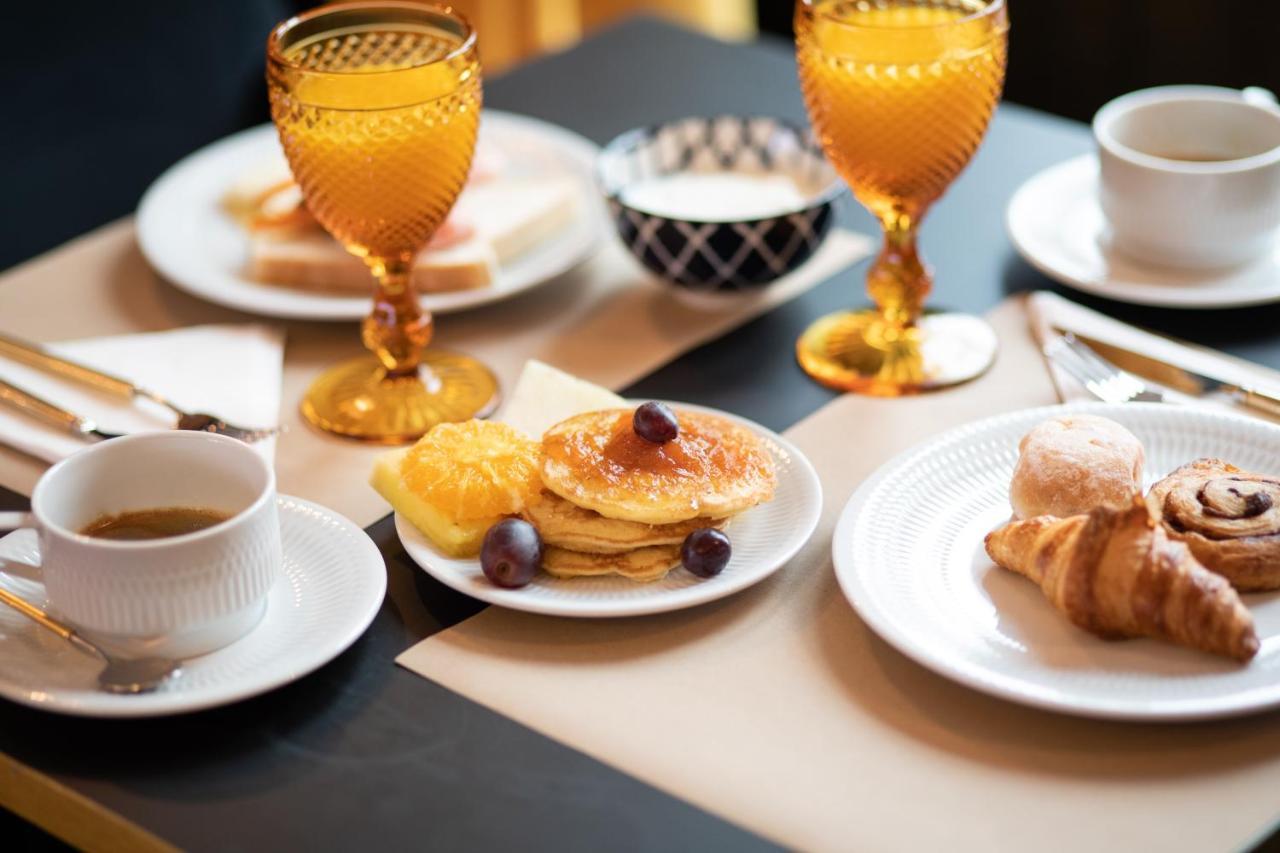 Hotel Republica Boutique Hotel Tomar Extérieur photo A typical breakfast in Paris