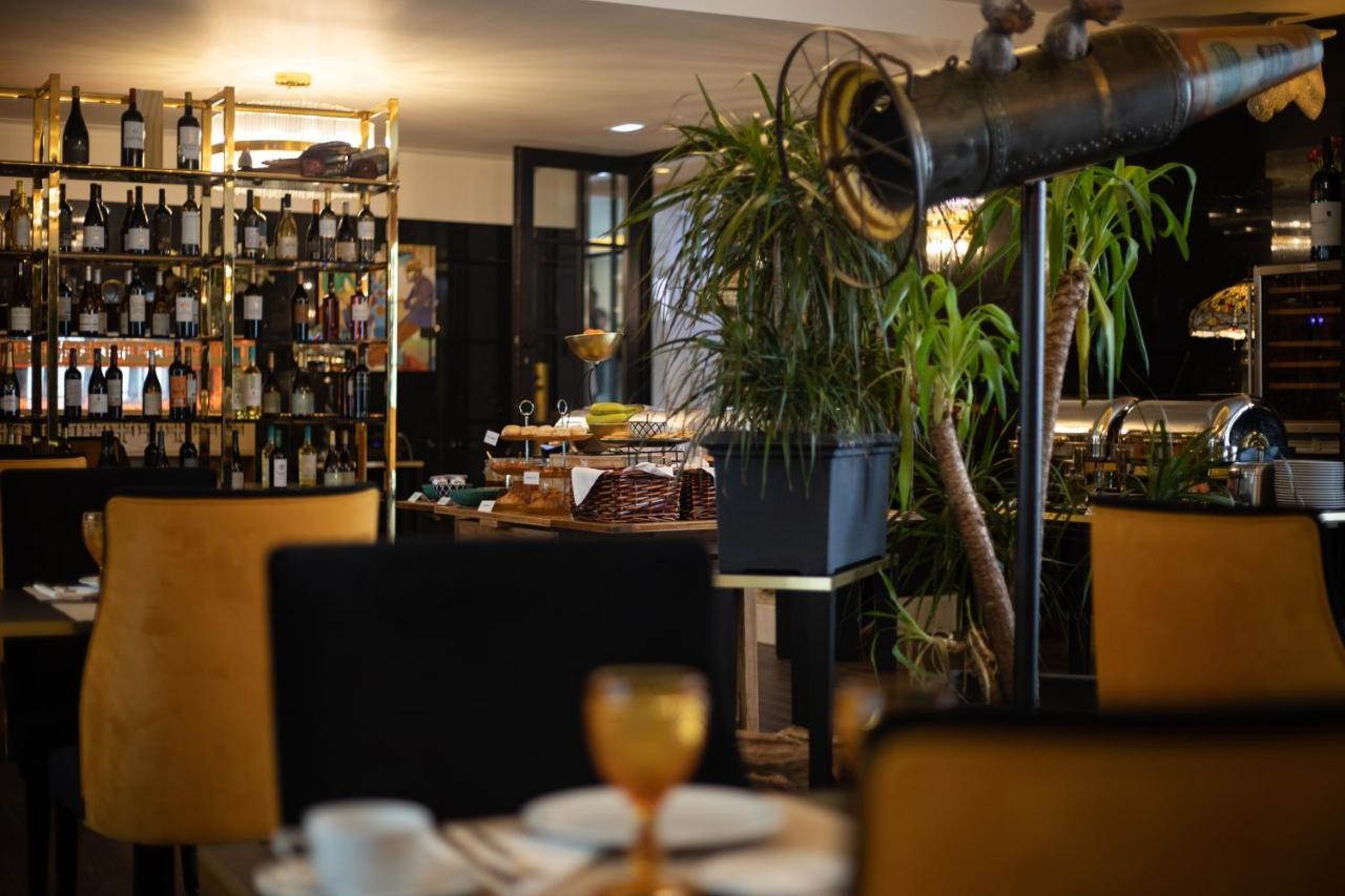 Hotel Republica Boutique Hotel Tomar Extérieur photo The interior of the restaurant
